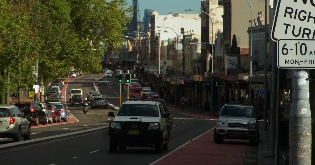 Street parked vehicles across Oxford street in Paddington